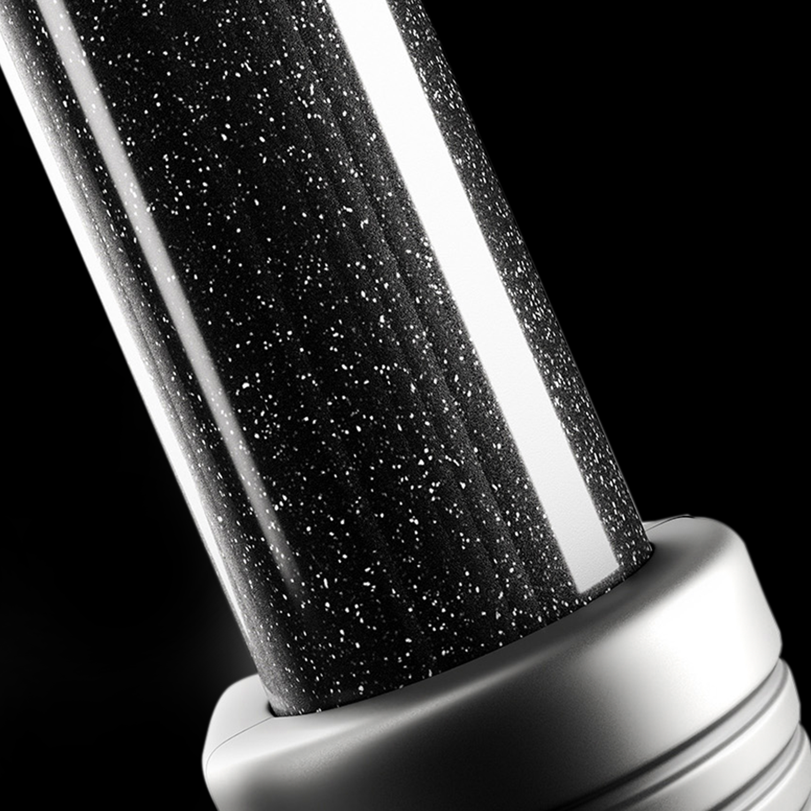 Close up of the mineral infused barrel on the CLOUD NINE Waving Wand.