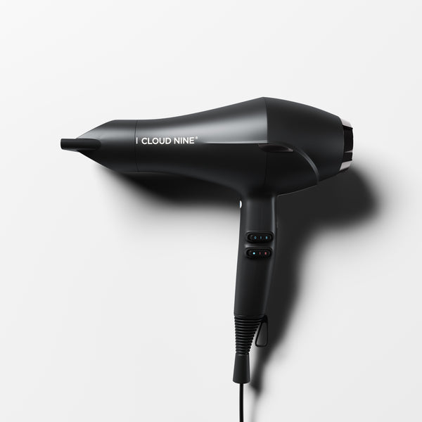 The Airshot hair dryer in black, displayed on a white background.