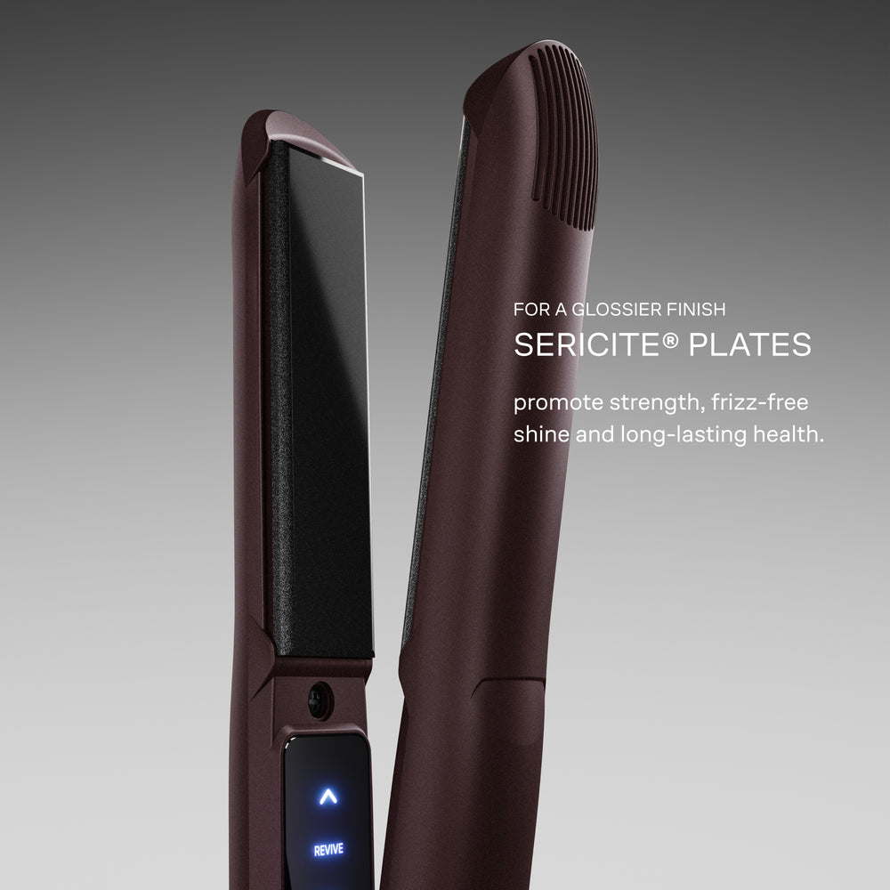 The Dark Burgundy Original Iron with Sericite plates displayed on a grey background. For a glossier finish, Sericite plates promote strength, frizz-free shine, and long-lasting health.