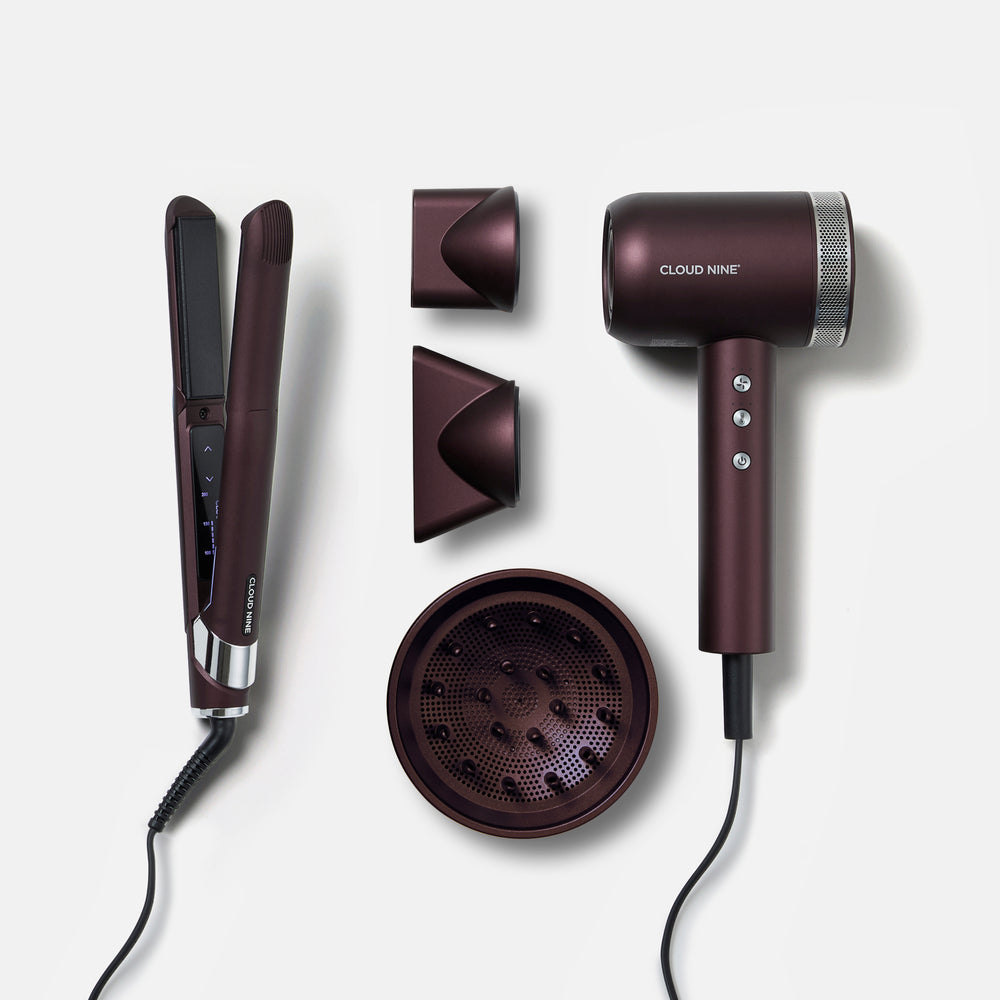 The Dark Burgundy Collection hair set, including The Original Iron, Airshot Pro hair dryer, magnetic attachments, and. diffuser, all laid out on a light grey background.