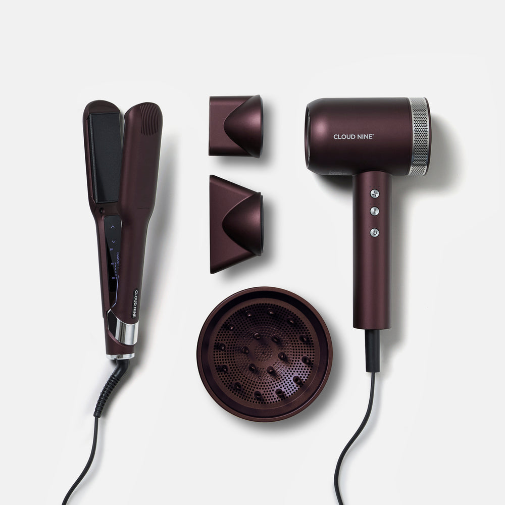 The Dark Burgundy Collection hair set, including The Wide Iron, Airshot Pro hair dryer, and magnetic attachments laid out on a light grey background.