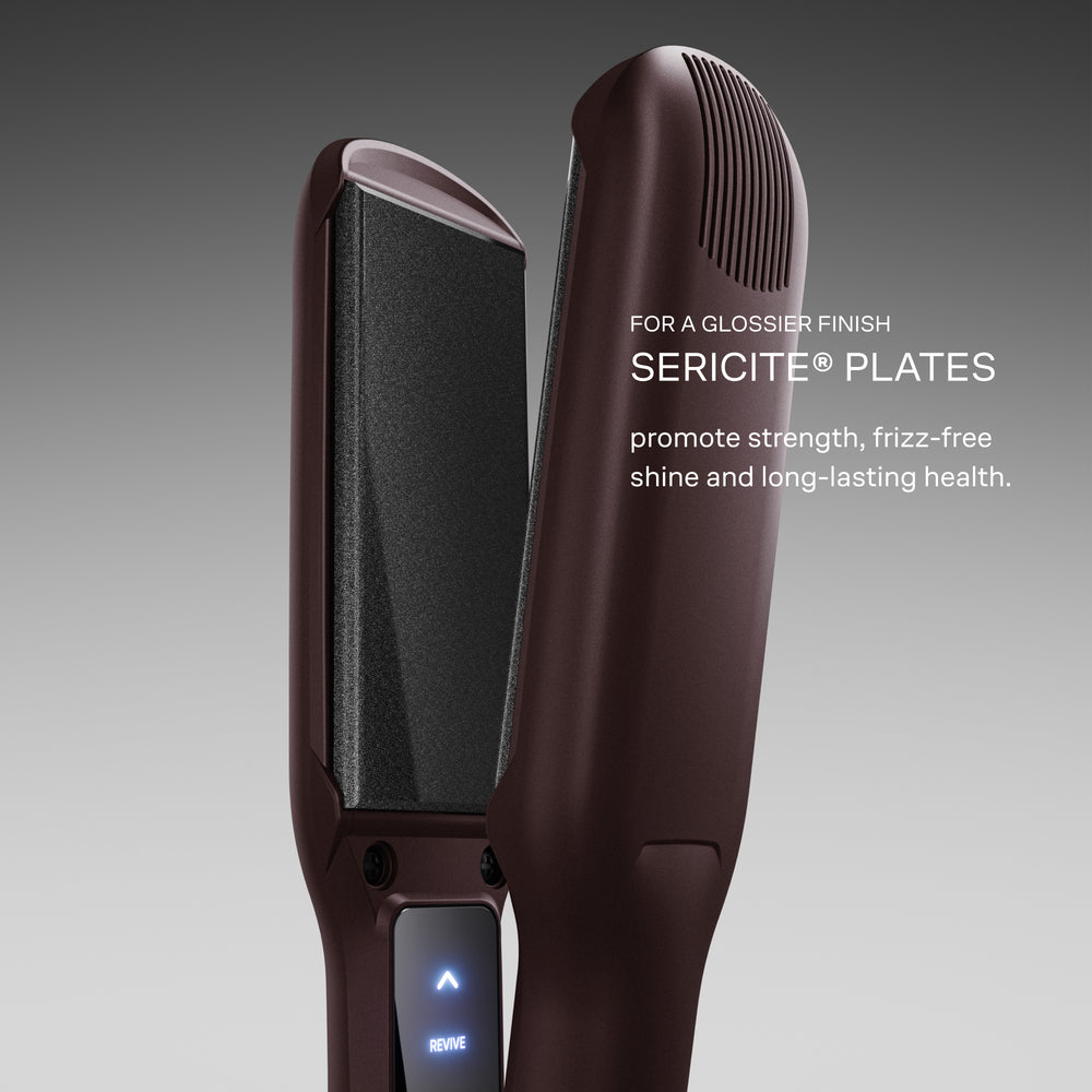 The Dark Burgundy Wide Iron with Sericite plates displayed on a grey background. For a glossier finish, Sericite plates promote strength, frizz-free shine, and long-lasting health.