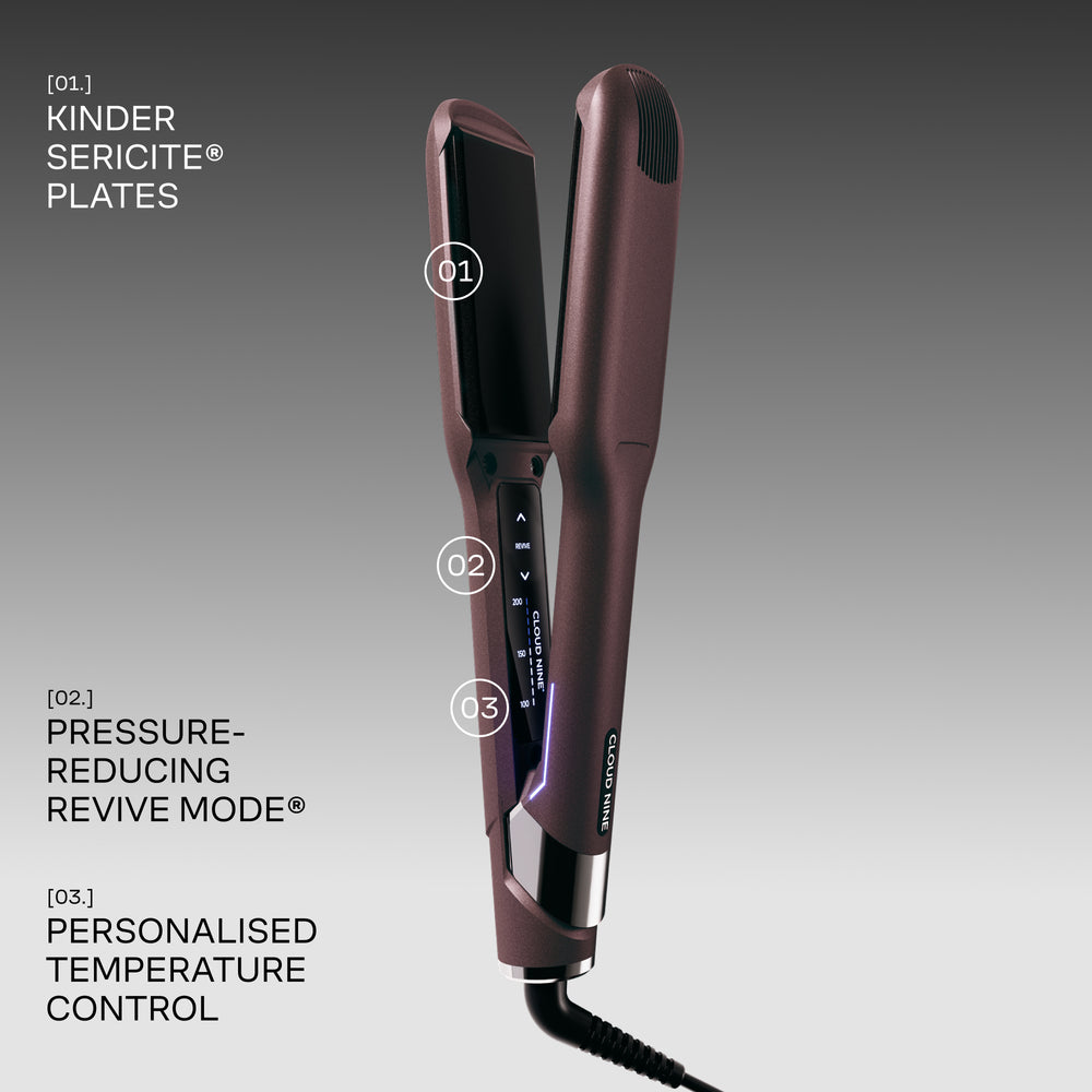 The Wide Iron in a Dark Burgundy finish with features highlighted on a grey background. Kinder Sericite plates, pressure-reducing Revive Mode, and personalised temperature control.