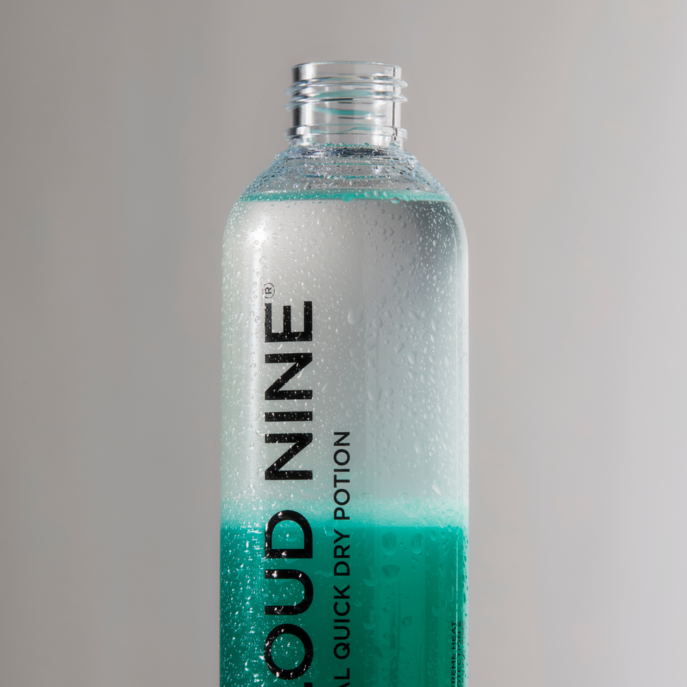 Bottle of the Magical Quick Dry Potion without the nozzle and 'Cloud Nine' branding.