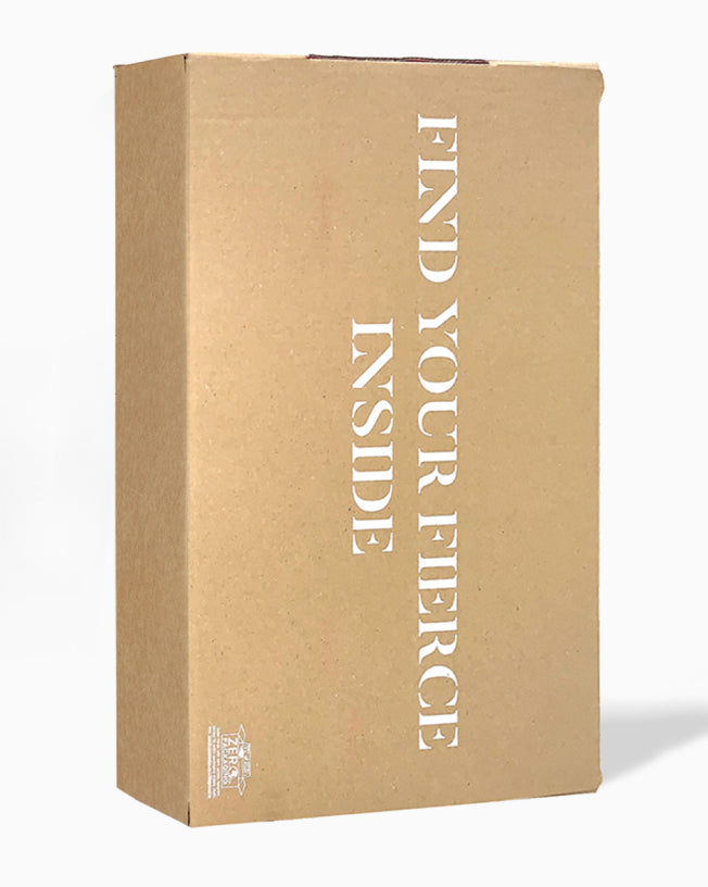 CLOUD NINE's eco-friendly packaging, a brown cardboard box with the writing ' Find your fierce inside'.