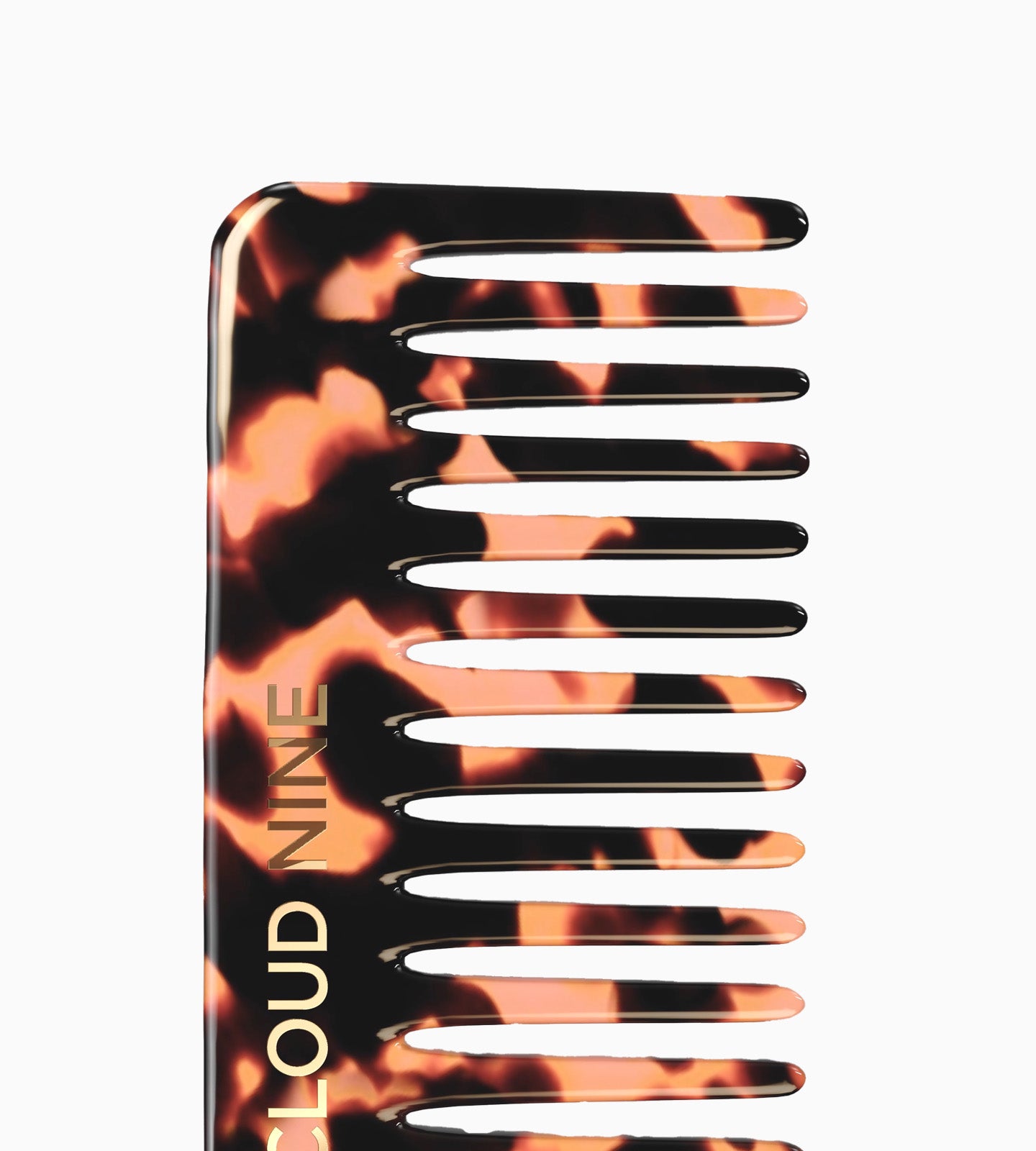 A close-up of the CLOUD NINE Tortoise Shell Luxury Wide Tooth Texture Comb on a white background.