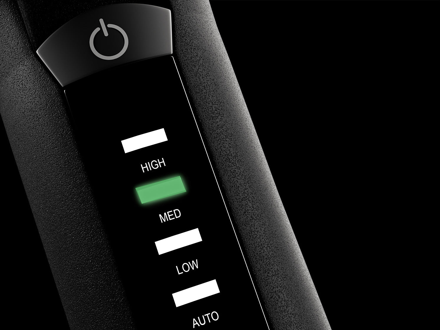 Close-up image of the variable temperature controls on the black CLOUD NINE Curling Wand on a black background.