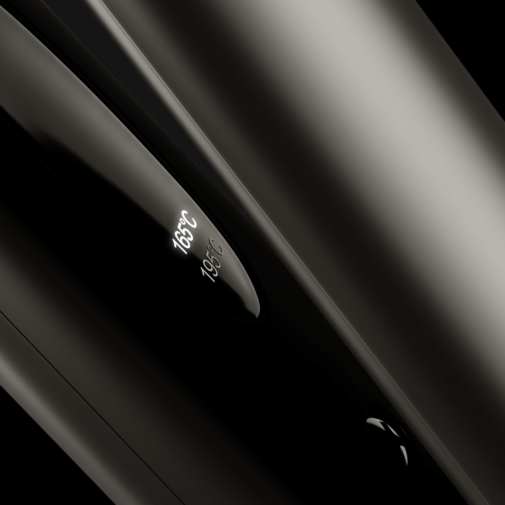 Close-up image of Touch Iron CLOUD NINE straighteners showing temperature control on black background.