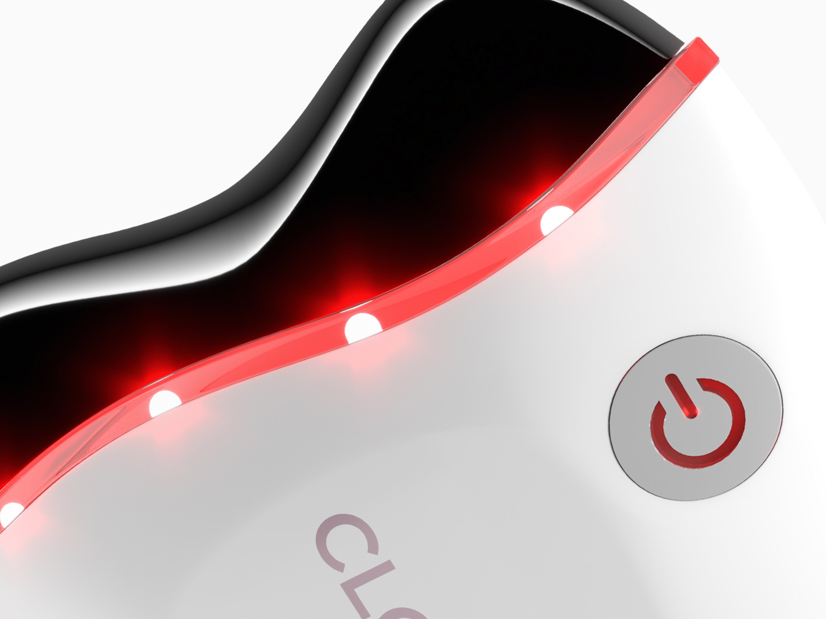 Close-up of the CLOUD NINE Revive on an angle with Red Light activated against a white background.